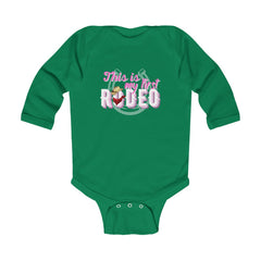 (First Rodeo Cowgirl) Infant Long Sleeve Bodysuit